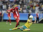 Canada's Christine Sinclair, left, scores her team's 2nd goal, during the 2016 Summer Olympics football match between Canada and Australia, at the Arena Corinthians, in Sao Paulo, Brazil, Wednesday, Aug. 3, 2016. Canada won 2-0.