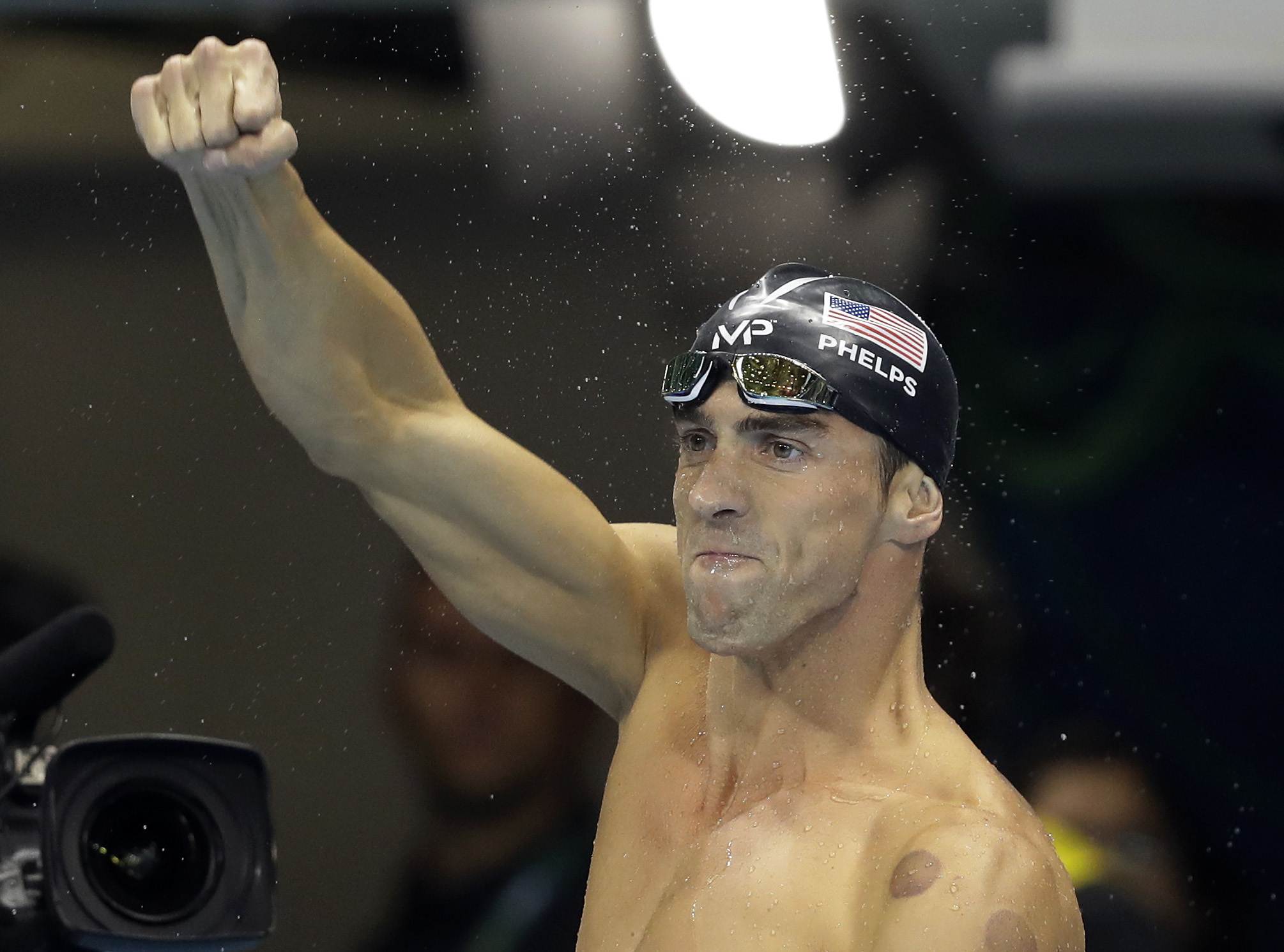United States' Michael Phelps celebrates after winning the gold medal during the swimming competitions at the 2016 Summer Olympics, Tuesday, Aug. 9, 2016, in Rio de Janeiro, Brazil.