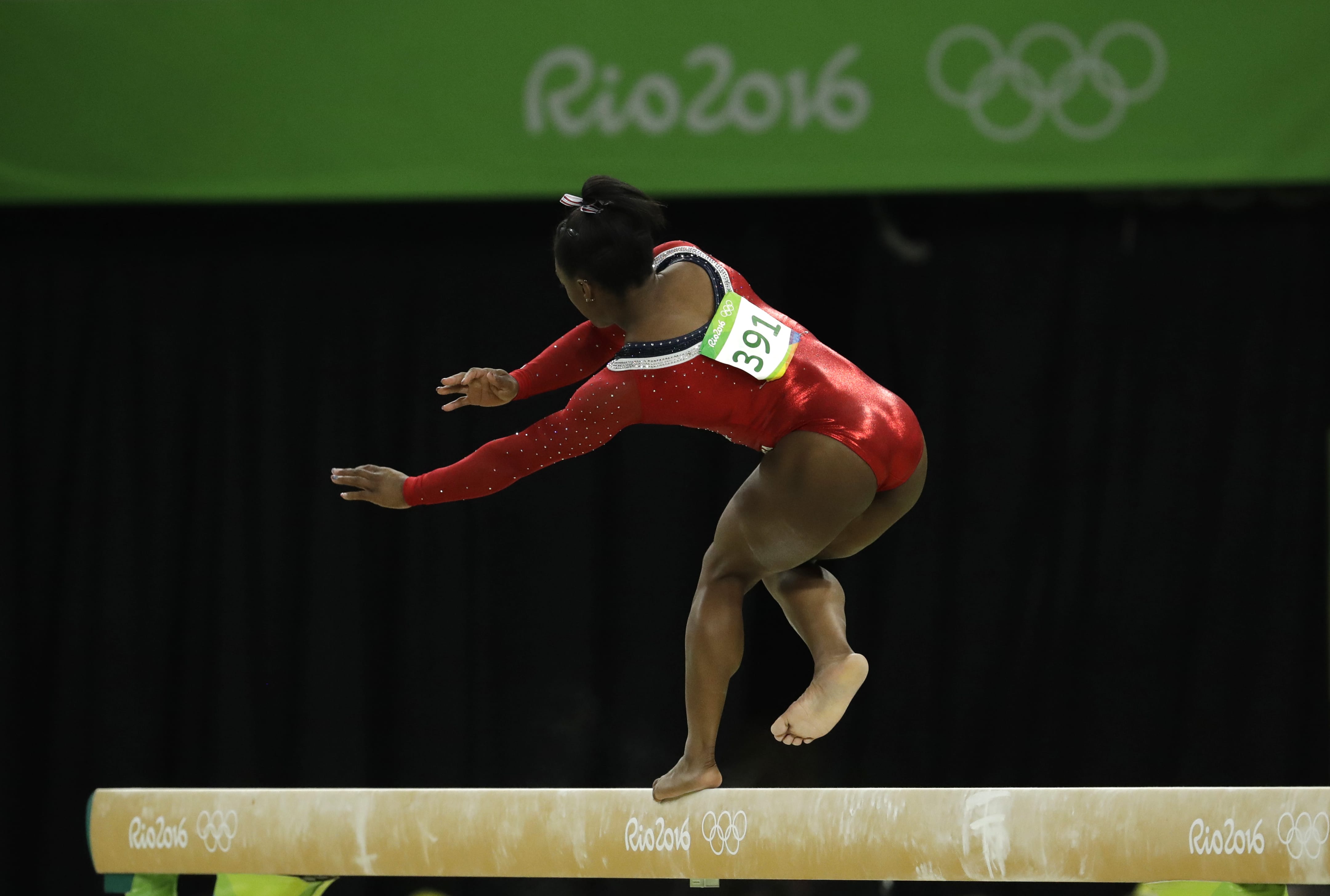 United States' Simone Biles stumbles during her performance on the balance beam during the artistic gymnastics women's apparatus final at the 2016 Summer Olympics in Rio de Janeiro, Brazil, Monday, Aug. 15, 2016.