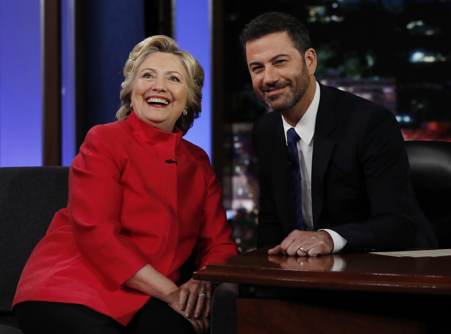 Democratic presidential nominee Hillary Clinton pauses to pose for a photograph Monday as she talks with Jimmy Kimmel during taping of &quot;Jimmy Kimmel Live!&quot; in Los Angeles.