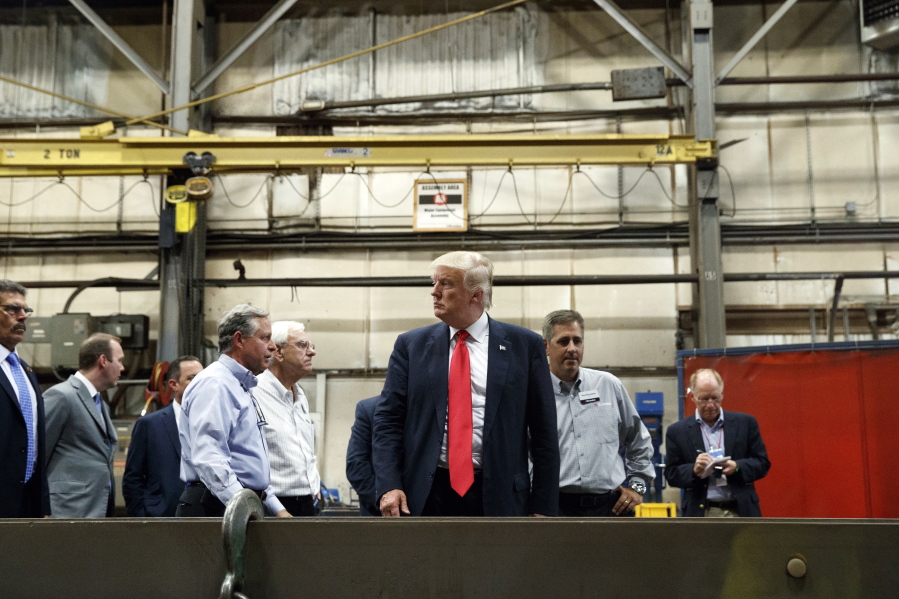 Republican presidential candidate Donald Trump tours McLanahan Corporation, a manufacturer of mineral and agricultural equipment in Hollidaysburg, Pa., on Friday.