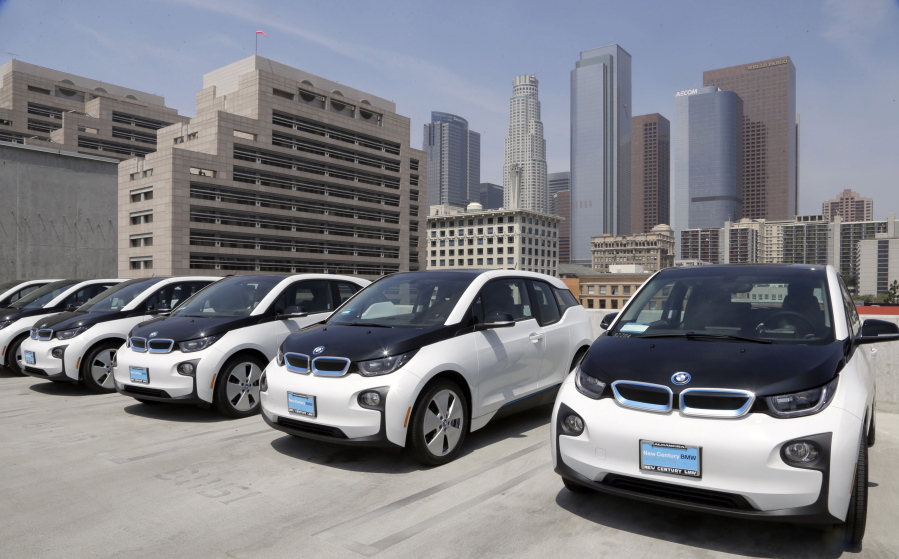 FILE - This June 8, 2016 file photo shows electric cars parked atop the Los Angeles Police Department parking lot, in Los Angeles.  A California lawmaker told The Associated Press on Friday, Aug. 12,  that she&#039;s introducing legislation to require that 15 percent of new vehicles be emission-free in less than a decade, a significant escalation in the state&#039;s efforts to speed the evolution of new car technology.