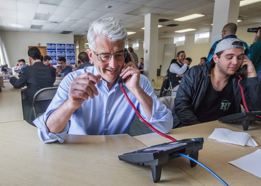 Republican candidate for Washington governor Bill Bryant phones potential voters and requests they submit their primary ballots on Tuesday at his campaign headquarters in Seattle&#039;s Sodo neighborhood. Bryant will advance to the general election to take on Gov. Jay Inslee.