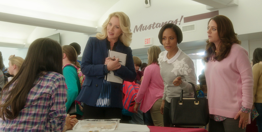 Christina Applegate, standing from left, Jada Pinkett Smith and Annie Mumolo chastise Mila Kunis for bringing store-bought doughnut holes to a bake sale in &quot;Bad Moms.&quot; (STX Productions)