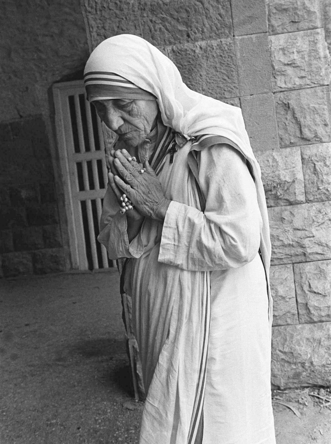 Mother Teresa prays at the Missionaries of Charity in East Beirut, Lebanon, on Aug. 15, 1982.
