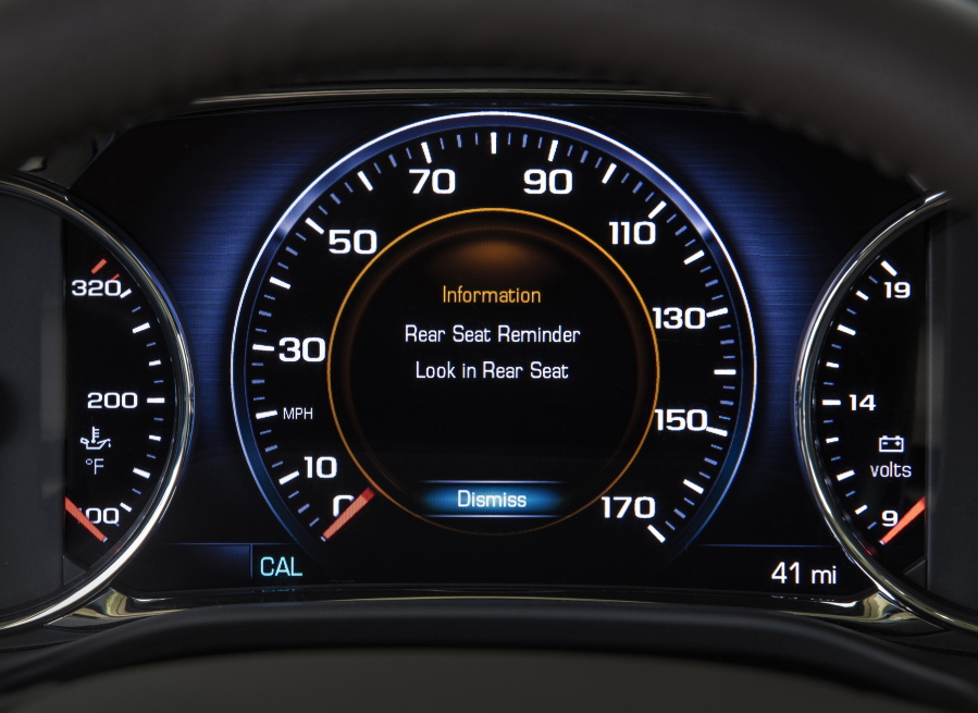 An industry-first Rear Seat Reminder alert on the instrument panel of the 2017 GMC Acadia, a midsize SUV. (A.J.