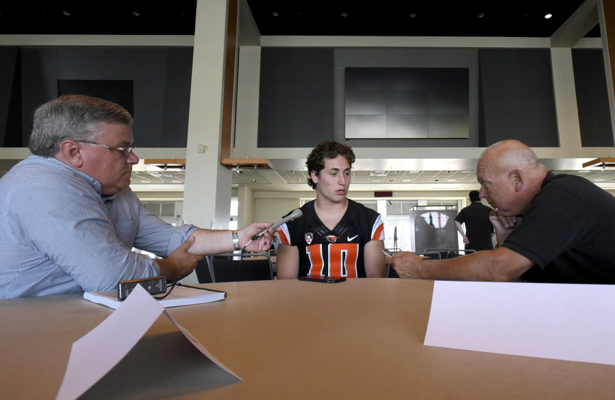 Reporters talk to Oregon State quarterback Darell Garretson during the NCAA college football team&#039;s media day at Reeser Stadium in Corvallis, Ore., on Tuesday, Aug. 2, 2016.