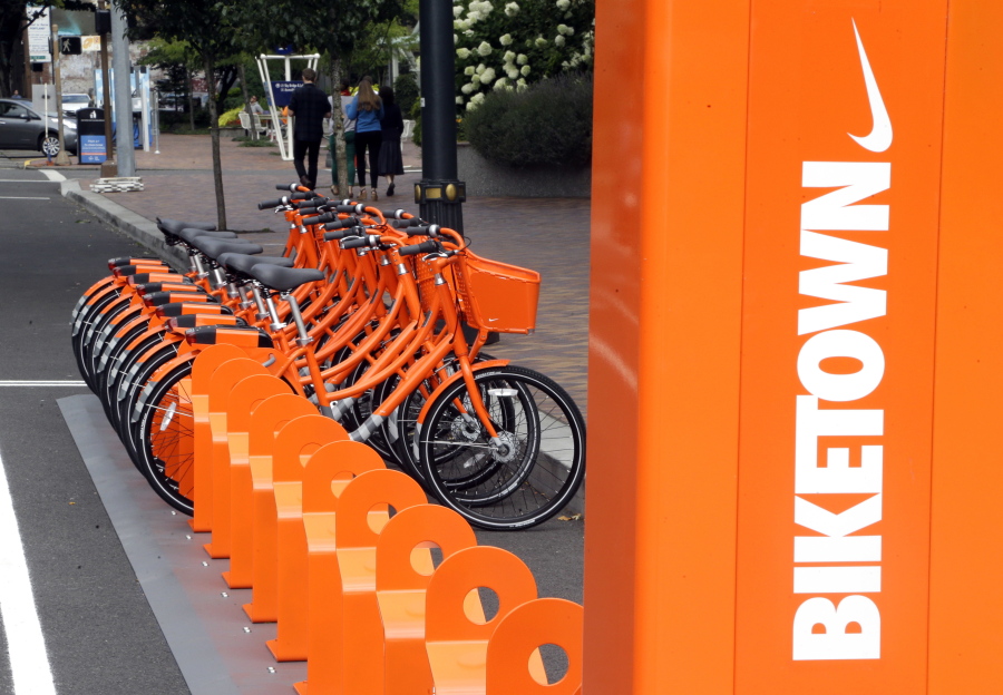 Bicycles stand at the ready in July for use in a bike-sharing program in Portland called Biketown. Portland residents have ridden 136,000 miles on bike-share program bikes since the program launched in July, according to the program.
