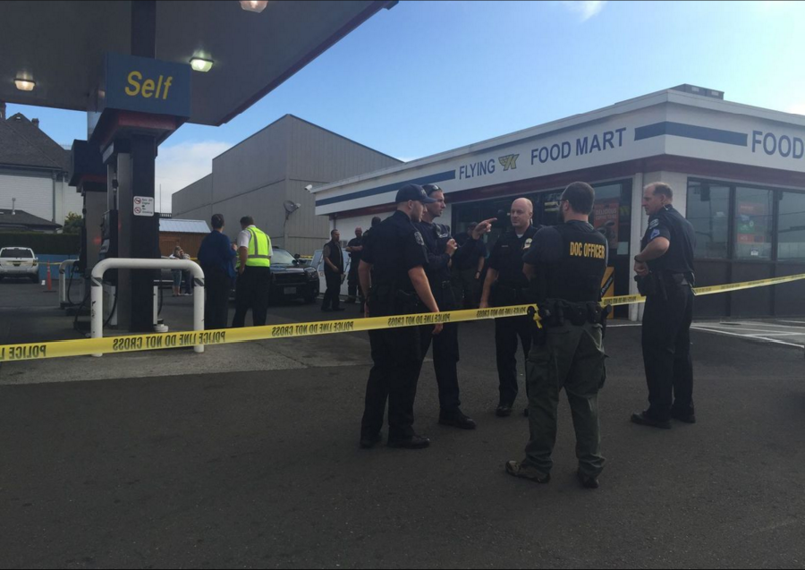 Officers were stationed outside the West Kelso Flying K gas station after an officer-involved shooting Wednesday Morning in Kelso.
