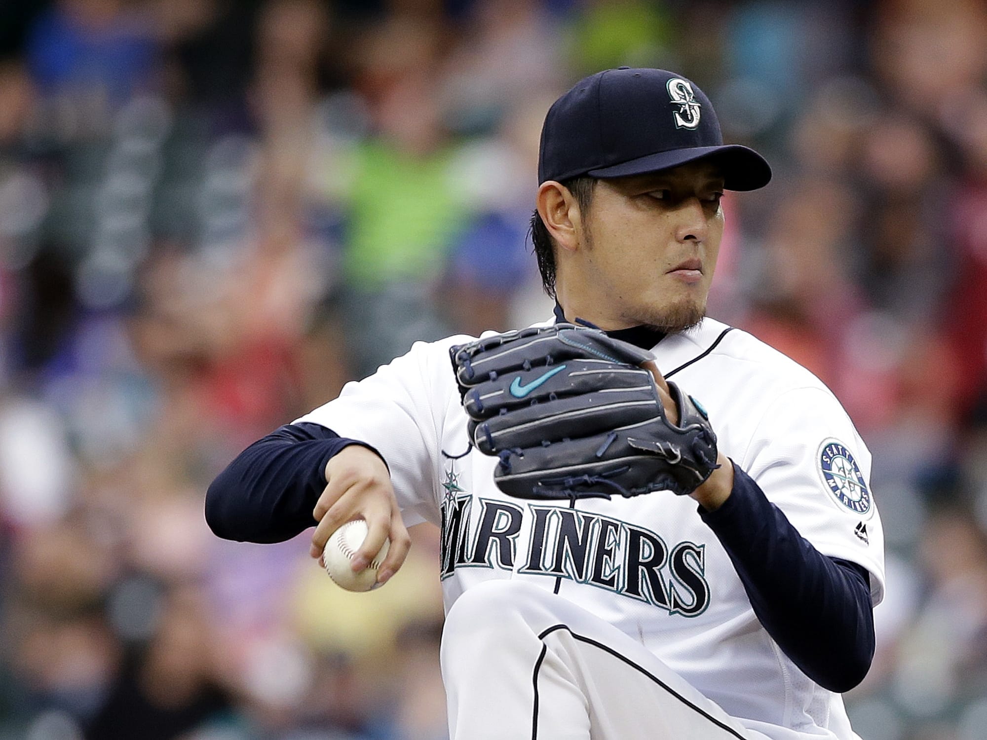 Seattle Mariners starting pitcher Hisashi Iwakuma throws against the Detroit Tigers in the first inning of a baseball game, Monday, Aug. 8, 2016, in Seattle.