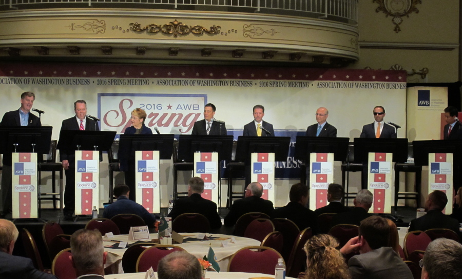 Eight of the 11 candidates for Washington lieutenant governor take part in a debate in Spokane on June 14. From left, Marty McClendon, Paul Addis, Sen. Karen Fraser, D-Olympia, Sen. Steve Hobbs, D-Lake Stevens, Bill Penor, Javier Figueroa, Sen. Cyrus Habib, D-Bellevue, and Phillip Yin, all stand at their podiums. The top two vote-getters in the Aug. 2, 2016 primary will advance to the Nov. 8, 2016, general election. (AP Photo/Nicholas K.