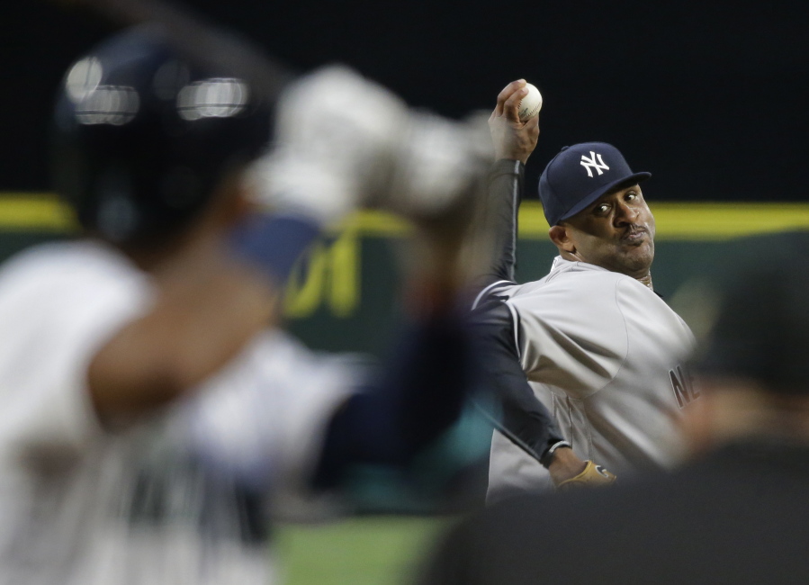 New York Yankees starting pitcher CC Sabathia throws against the Seattle Mariners in the fourth inning of a baseball game, Tuesday, Aug. 23, 2016, in Seattle. (AP Photo/Ted S.