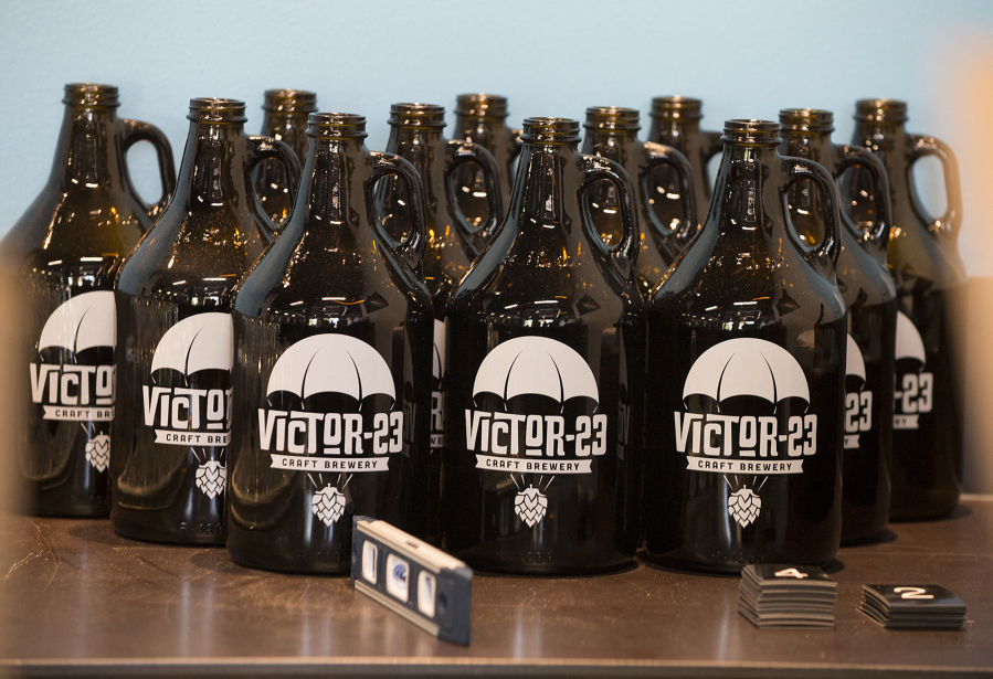 Brand new growlers are seen at Victor-23 Craft Brewery on Thursday morning.