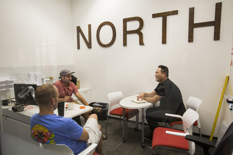 Mike Stone, right, the CEO of MakersKit, talks with Ryan Broshar, top left, Techstar&#039;s managing director and Brett Brohl, Techstar&#039;s entrepreneur in residence during a meeting on Aug. 17, 2016 in Minneapolis.