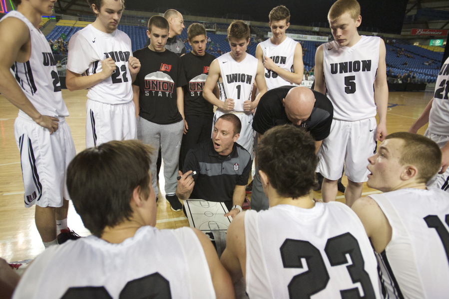 Blake Conley coaches his team as Union beats Woodinville 69-45 to win third place at the 2015 WIAA Hardwood Classic 4A Boys tournament at the Tacoma Dome, Saturday, March 7, 2015.