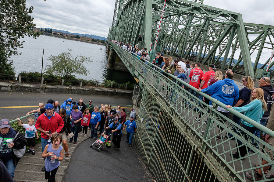 Participants in the 15th annual Hands Across the Bridge sobriety event walked from Esther Short Park in downtown Vancouver up to the Interstate 5 Bridge on Monday.