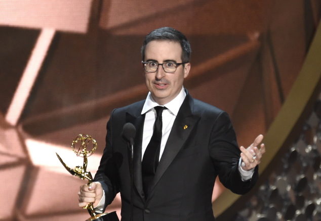 John Oliver of ?Last Week Tonight with John Oliver? accept the award for outstanding variety talk series at the 68th Primetime Emmy Awards on Sunday at the Microsoft Theater in Los Angeles.