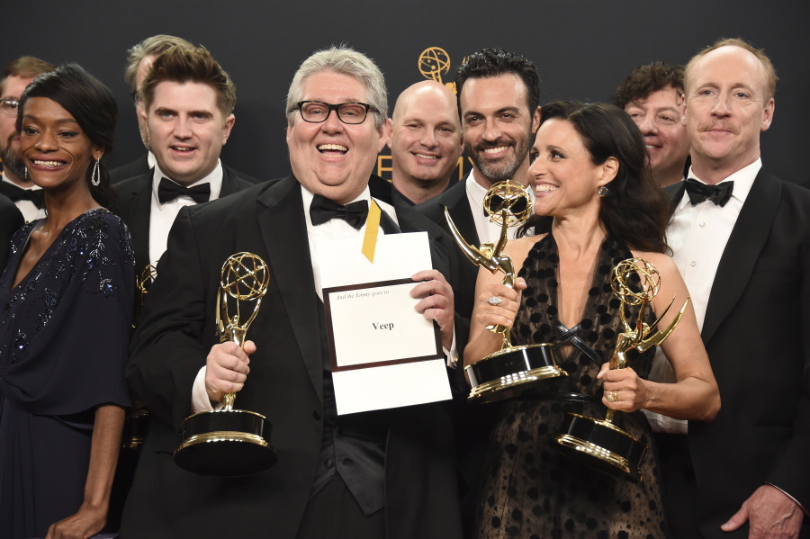 David Mandel, center, Julia Louis-Dreyfus, foreground right, and the cast and crew from &quot;Veep&quot; were named outstanding comedy series Sunday at the 68th Primetime Emmy Awards at the Microsoft Theater in Los Angeles.