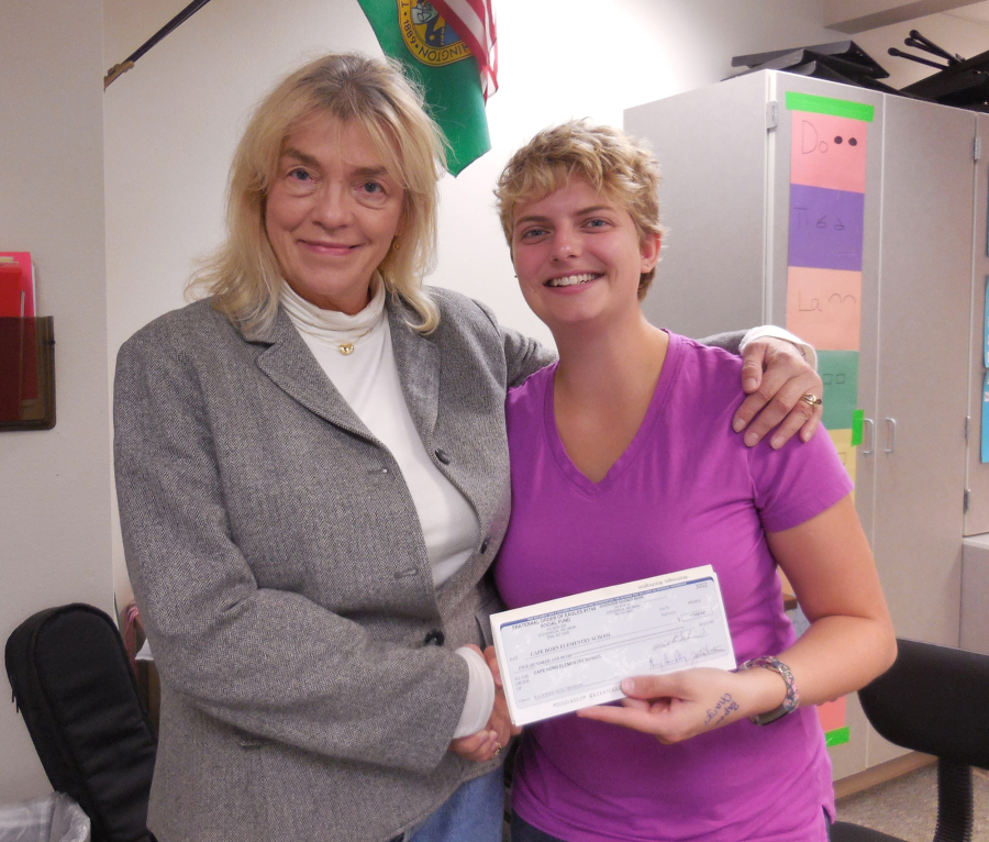 Washougal: Fraternal Order of Eagles representative Karen Ditzler, left, presenting a check to Cape Horn-Skye Elementary School music teacher Anna Breithaupt for $500, which will go to the music program at Cape Horn and Canyon Creek Middle School.