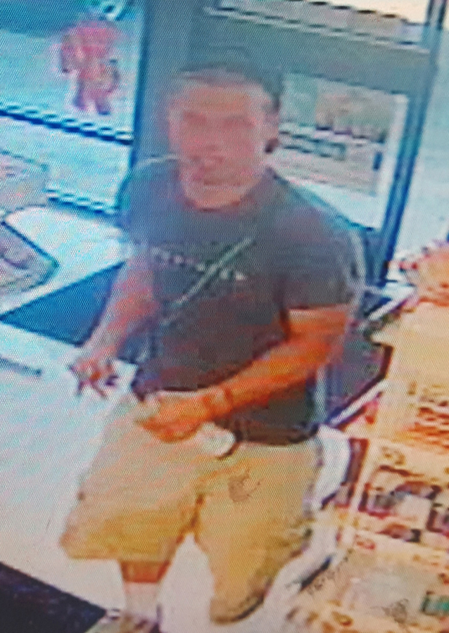 The police are trying to identify this man, who investigators think is connected to a car prowl and credit card fraud case.
