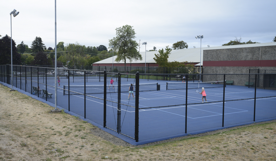 Women play tennis in the newly re-built outdoor tennis courts at the Vancouver Tennis Center, Tuesday August 30, 2016.