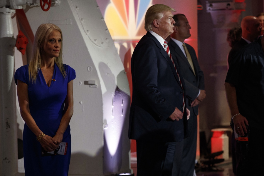 Republican presidential candidate Donald Trump waits with his campaign manager Kellyanne Conway, left, waits to be introduced during the Commander in Chief Forum hosted by NBC on Wednesday in New York.