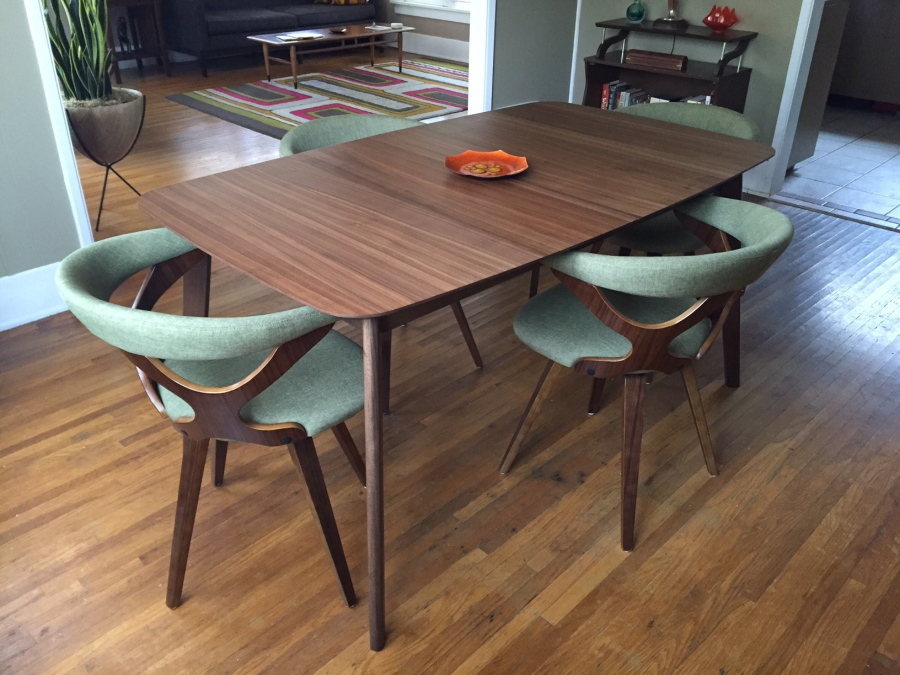 This midcentury modern-inspired dining room table and chairs is part of a Pasadena, Calif., home.