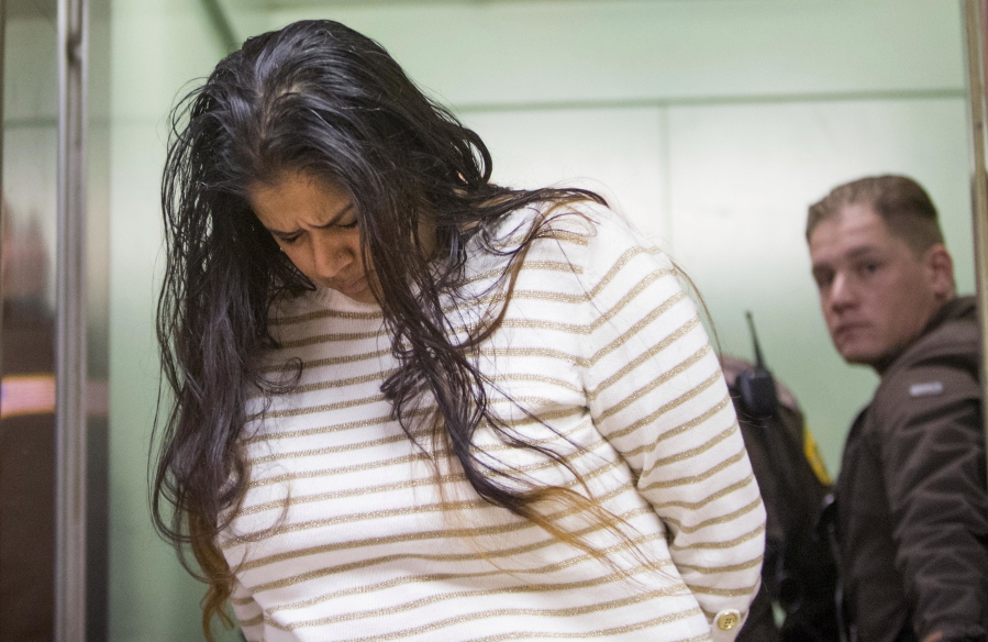 Purvi Patel is taken into custody at the St. Joseph County Courthouse in South Bend, Ind., after being sentenced to 20 years in prison for feticide and neglect of a dependent. Her sentence was overturned and she was re-sentenced to 18 months.