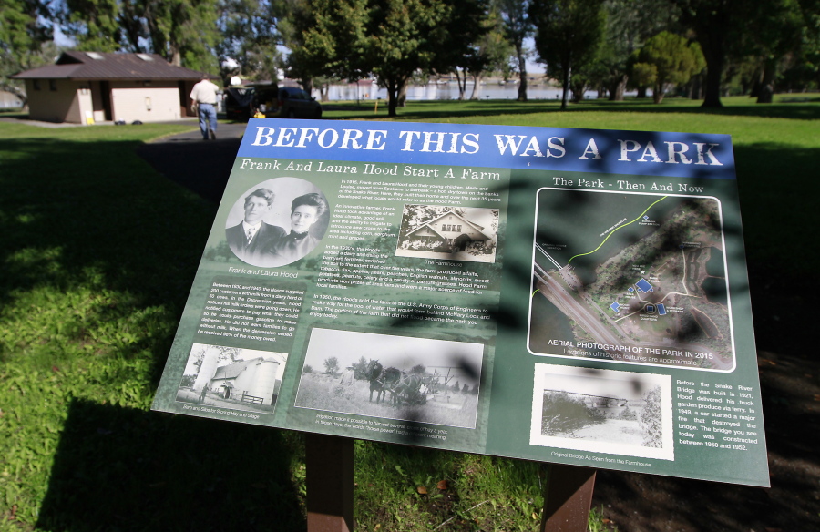 This Sept. 7, 2016 photo shows a new interpretive sign explaining the history behind Hood Park on the Snake River in Walla Walla, Wash.