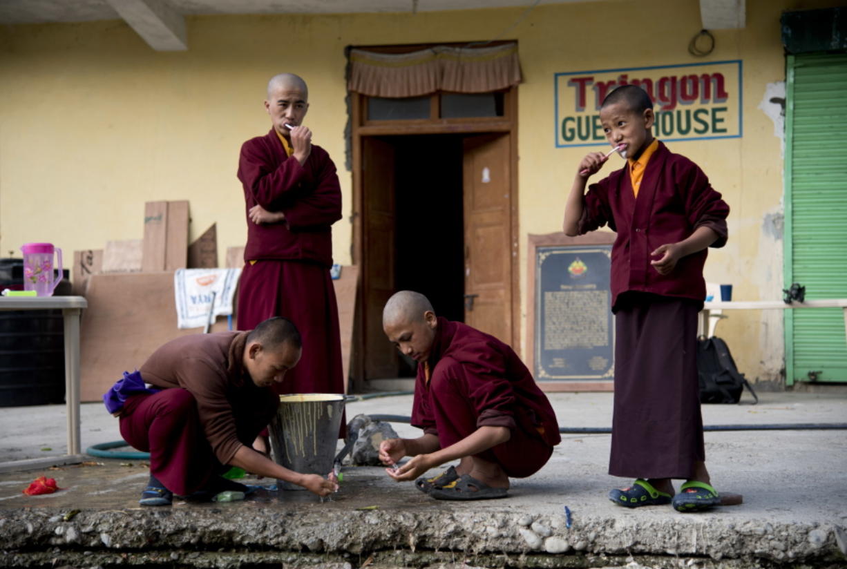 Young monks brush their teeth at the Kongri monastery in Spiti Valley, India. For centuries, the valley nestled in the Indian Himalayas remained a hidden Buddhist enclave. That&#039;s all now starting to change.