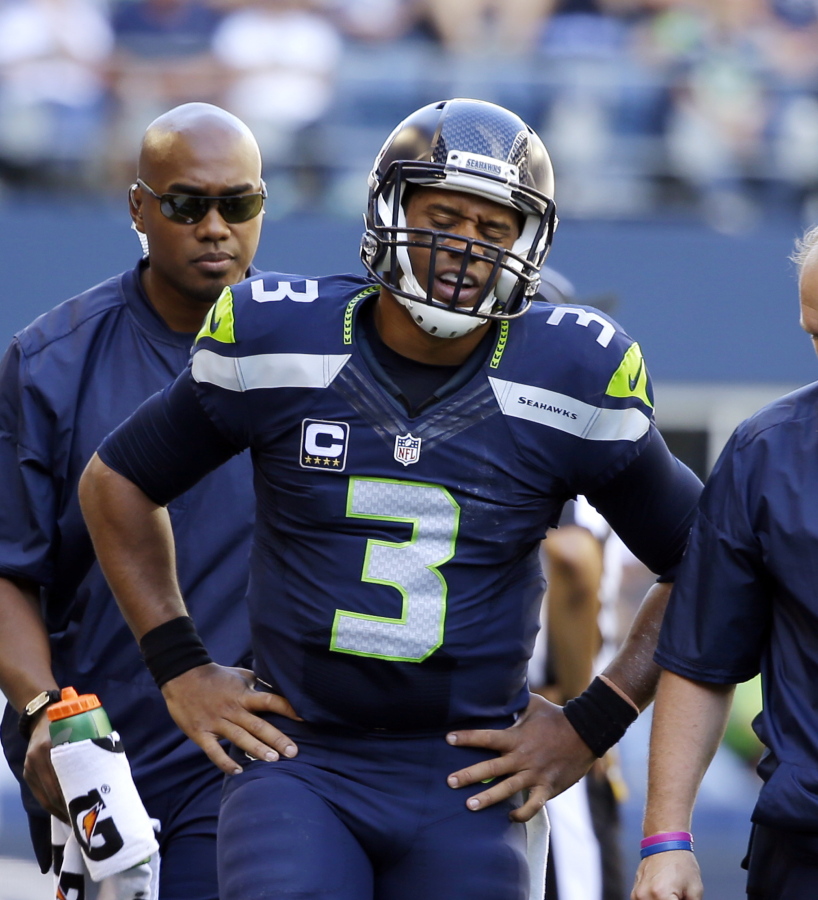 Despite spraining the medial collateral ligament in his left knee last Sunday against San Francisco, Seattle quarterback Russell Wilson is expected to start against the New York Jets. (AP Photo/Ted S.