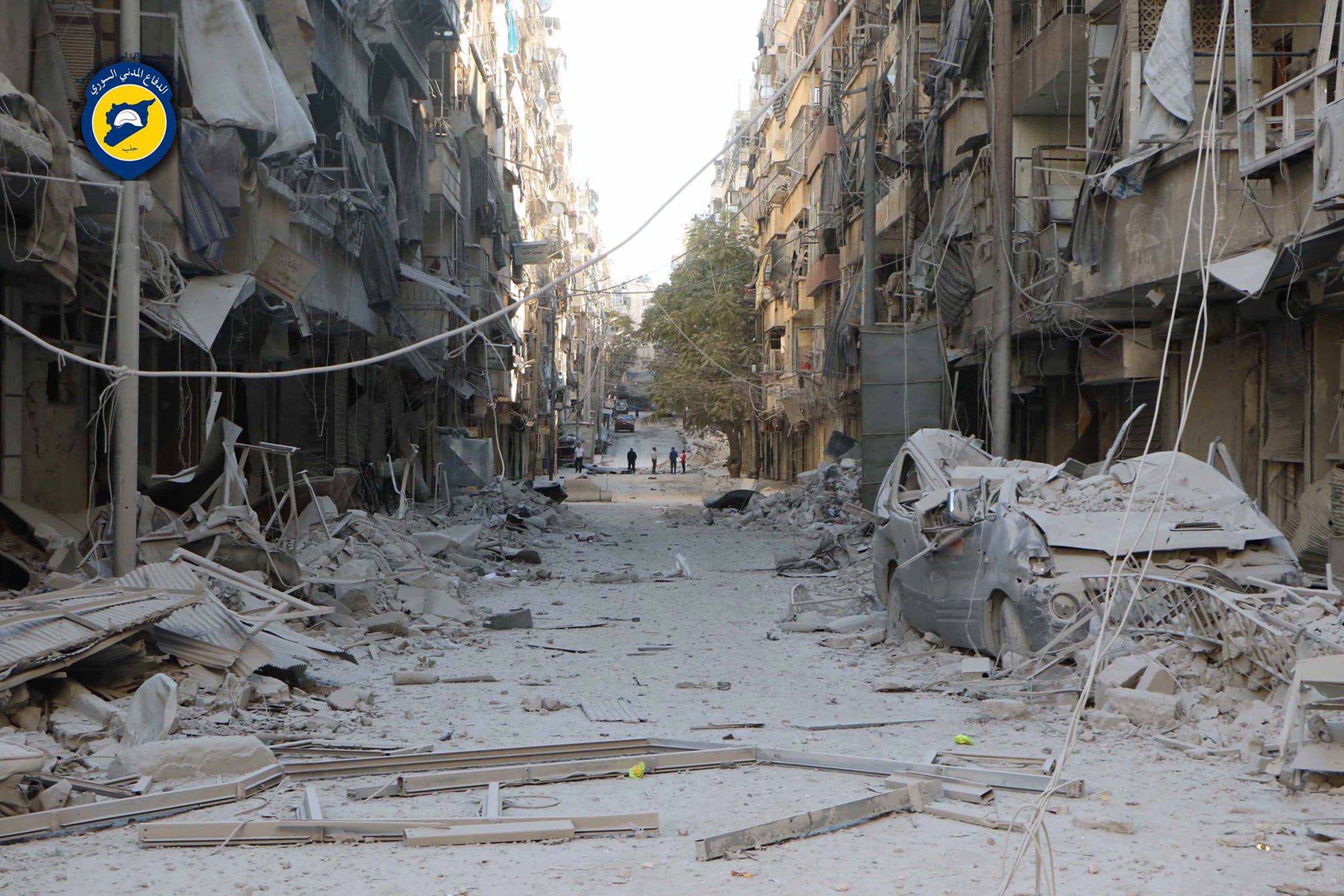 In this photo provided by the Syrian Civil Defense group known as the White Helmets, shows heavily damaged buildings after airstrikes hit in Aleppo, Syria, Saturday, Sept. 24, 2016. Syrian government forces captured a rebel-held area on the edge of Aleppo on Saturday, tightening their siege on opposition-held neighborhoods in the northern city as an ongoing wave of airstrikes destroyed more buildings.