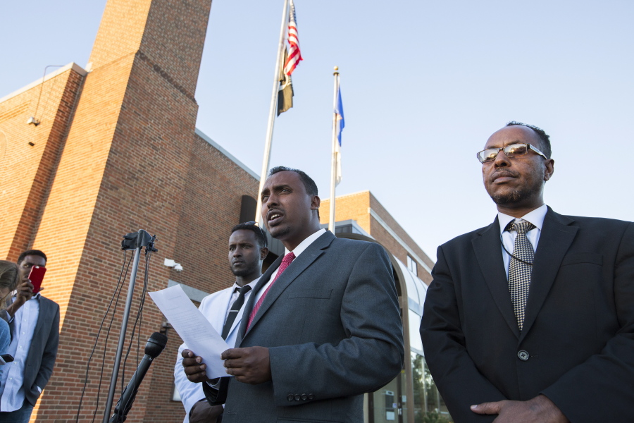 Abdulwahid Osman, the lawyer for the family of Dahir Ahmed Adan, speaks during a news conference at St. Cloud City Hall in St. Cloud, Minn., on Monday. Adan went to a central Minnesota mall and cut or stabbed 10 people before he was shot and killed by an off-duty police officer on Saturday.