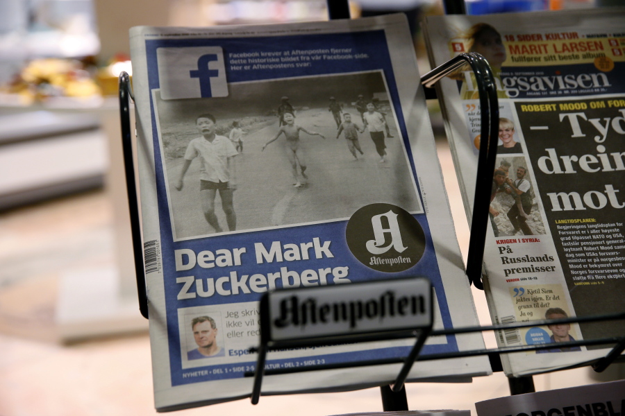 The cover to Norway&#039;s largest circulation newspaper, Aftenposten, is displayed Friday in Oslo. Editor-in-chief and CEO Espen Egil Hansen wrote an open letter to founder and CEO of Facebook, Mark Zuckerberg, accusing him of threatening the freedom of speech and abusing power after deleting the iconic picture from the Vietnam war, taken by Associated Press photographer  Nick Ut, of a young girl running from a napalm attack. The Pulitzer Prize-winning image by Nick Ut is at the center of a heated debate about freedom of speech in Norway after Facebook deleted it from a Norwegian author&#039;s page.