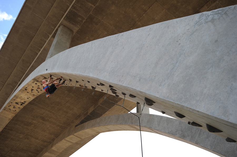 Ryan Palo makes his way up the Maple Bridge Arches climbing route shortly after it was officially opened to the public in August 2015 in Redmond, Ore. The acclaimed recreational climbing route and one of the only overhang climbing areas in the country has been closed because of liability concerns.