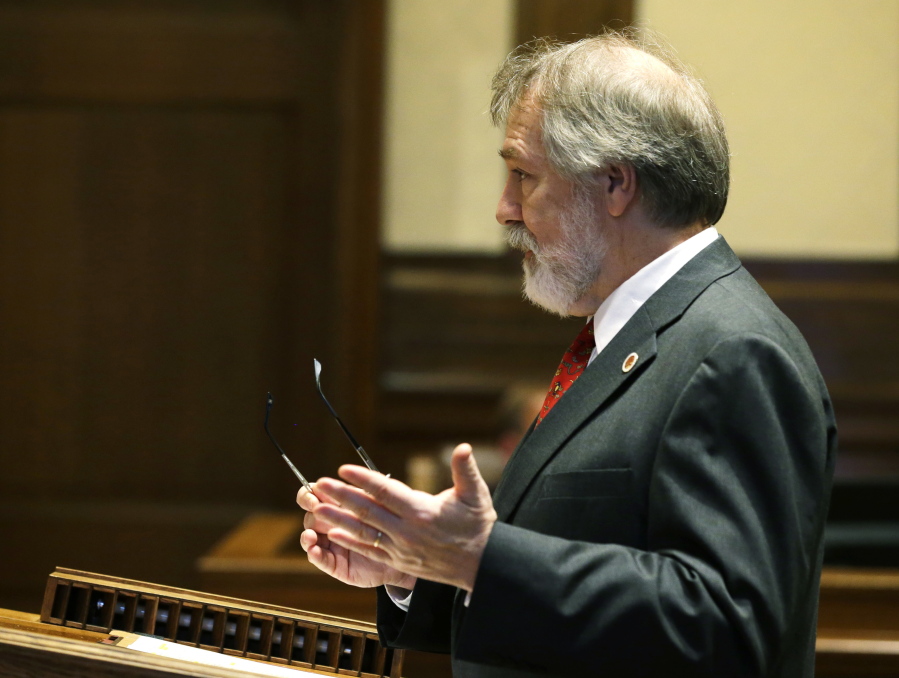 Alan Copsey, a deputy attorney general for the state of Washington, speaks during a hearing before the Washington State Supreme Court regarding a lawsuit against the state over education funding, Wednesday, Sept. 7, 2016, in Olympia, Wash. The state wants the court to remove a contempt order and $100,000-a-day sanctions that have been accumulating for more than a year and which are supposed to be set aside into an education account.  (AP Photo/Ted S.