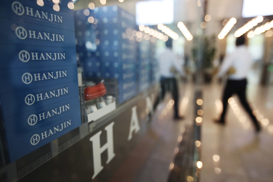 A model of container ship with Hanjin Shipping Co.&#039;s logos is displayed at its head office in Seoul, South Korea, Thursday, Sept. 22, 2016. Hanjin Shipping is to receive as much as $100 million in additional funds to resolve the cargo crisis caused by its slide toward bankruptcy.