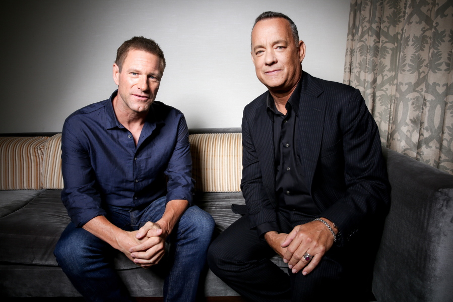Aaron Eckhart, left, and Tom Hanks star in &quot;Sully.&quot; Hanks plays Captain Chesley Sullenberger, aka &quot;Sully,&quot; in Clint Eastwood&#039;s latest film. Eckhart plays co-pilot Jeff Skiles.