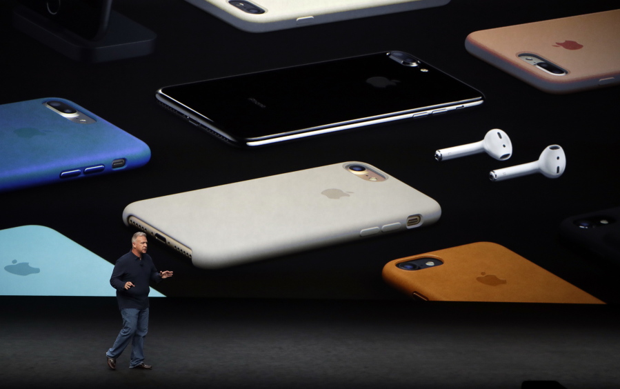 Phil Schiller, Apple&#039;s senior vice president of worldwide marketing, talks about the pricing on the new iPhone 7 during a Sept. 7 event to announce new products, in San Francisco. The new iPhones are better, even when considering that the most dramatic change is what got taken away: the traditional headphone jack.