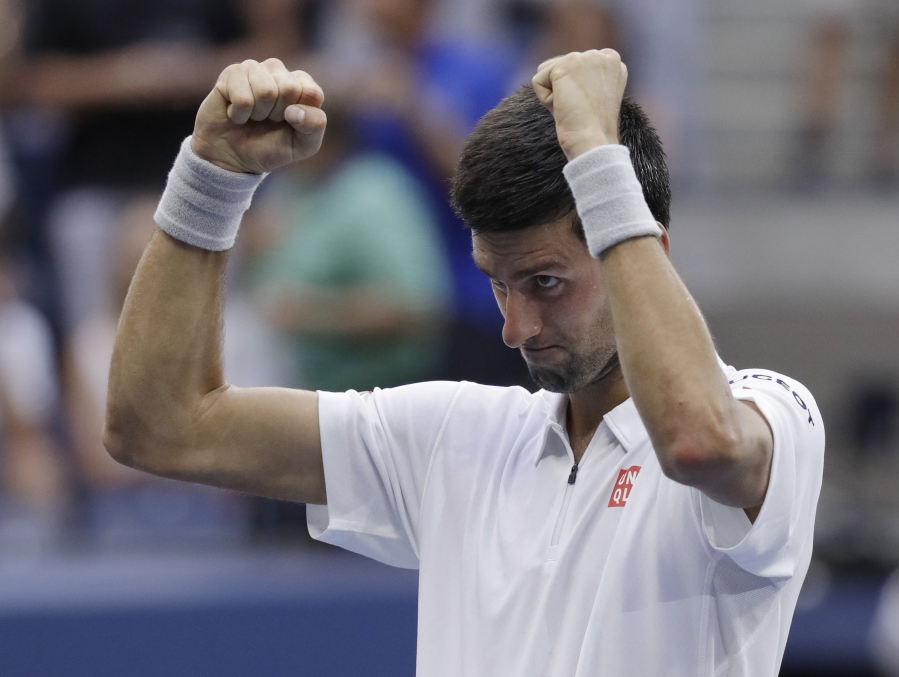 Novak Djokovic, of Serbia, reacts after defeating Gael Monfils, of France, during the semifinals of the U.S. Open tennis tournament, Friday, Sept. 9, 2016, in New York.
