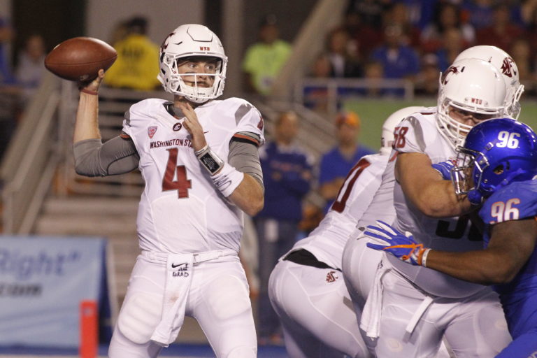Washington State quarterback Luke Falk (4) passes during the first half of an NCAA college football game against Boise State in Boise, Idaho, on Saturday, Sept. 10, 2016.