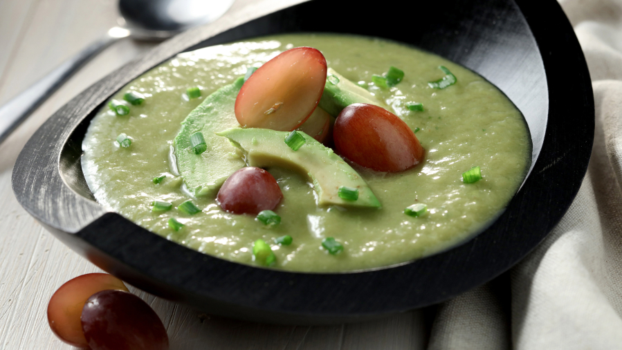 Upgrade the soup and sandwich combo with a cucumber and avocado gazpacho. Top it with red grapes, chives and more avocado.