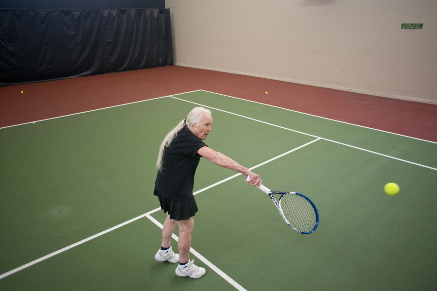 Jean &quot;Sunny&quot; Schiffmann, 92, returns a volley at Club Green Meadows in Vancouver on Monday, September 26, 2016.