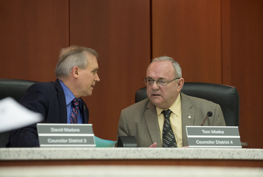 Clark County Councilors David Madore and Tom Mielke take a moment to chat before the start of a March 22 meeting at the Clark County Public Service Center.