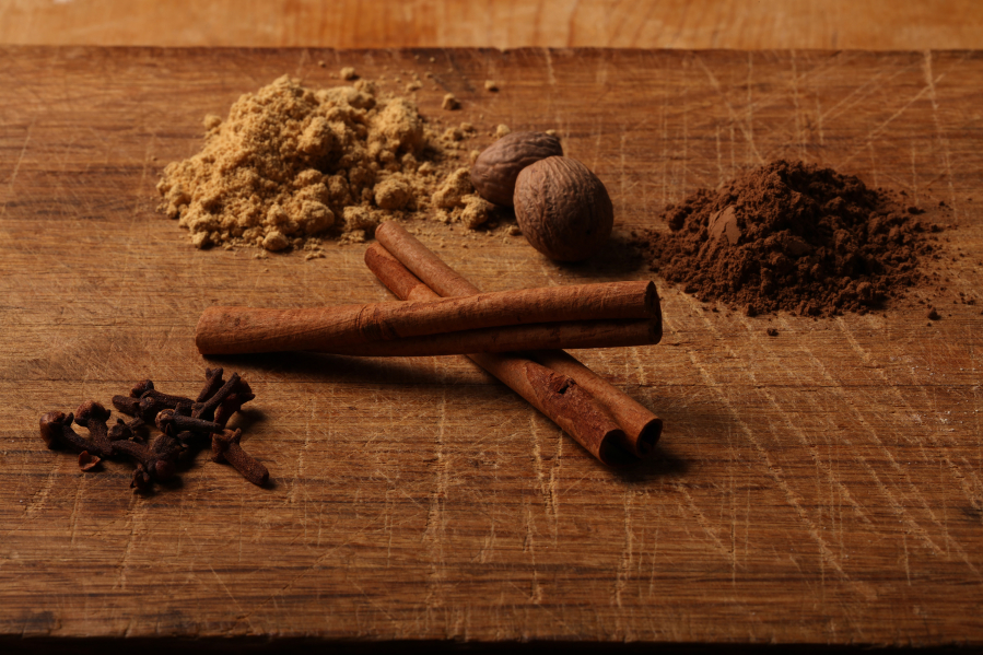 Make your own pumpkin spice mix for better flavor with, clockwise from center, cinnamon, cloves, ginger, nutmeg and allspice. (Photos by E.