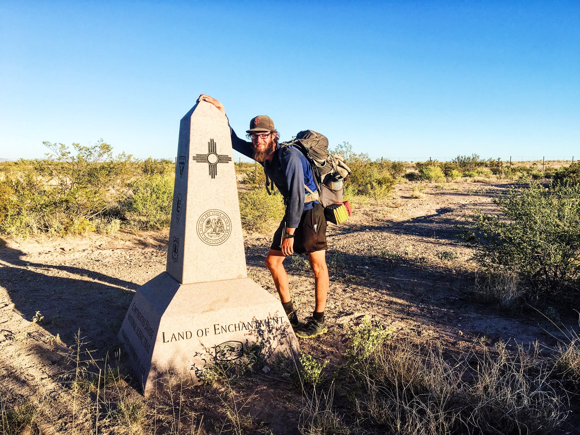 Jeff Garmire of Vancouver rests at the southern terminus of the Continental Divide Trail in New Mexico.