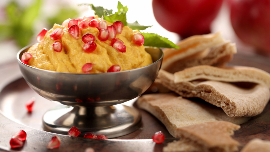 The pumpkin dip sees the squash pureed with yogurt, tahini and plenty of roasted garlic, and brightened with lemon juice and pomegranate seeds.