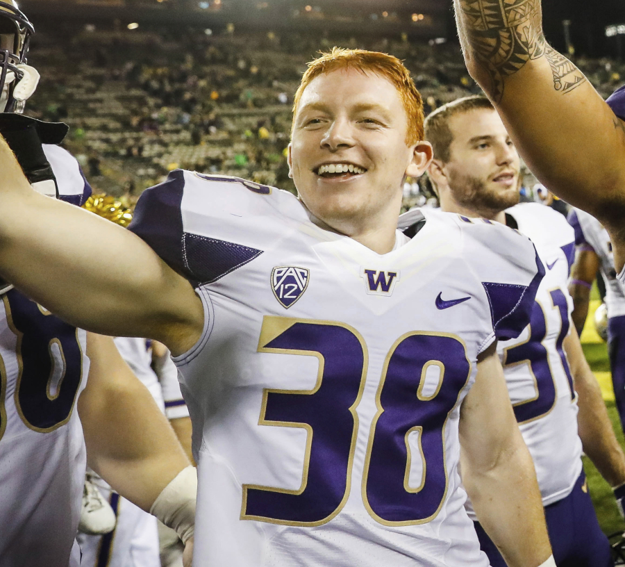 Washington Hayden Schuh (38) celebrates with his team after an NCAA college football game Saturday, Oct. 8, 2016, in Eugene, Ore. Washington beat Oregon 70-21.