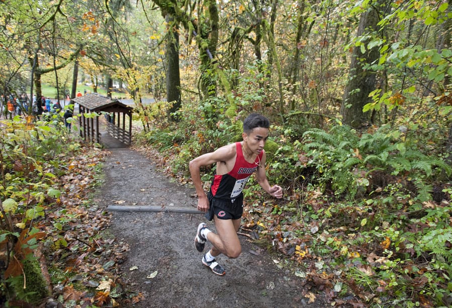 Camas&#039; Yacine Guermali makes his way through the course while on his way to taking first place in the boys race at Lewisville Park on Thursday afternoon, Oct. 20, 2016.
