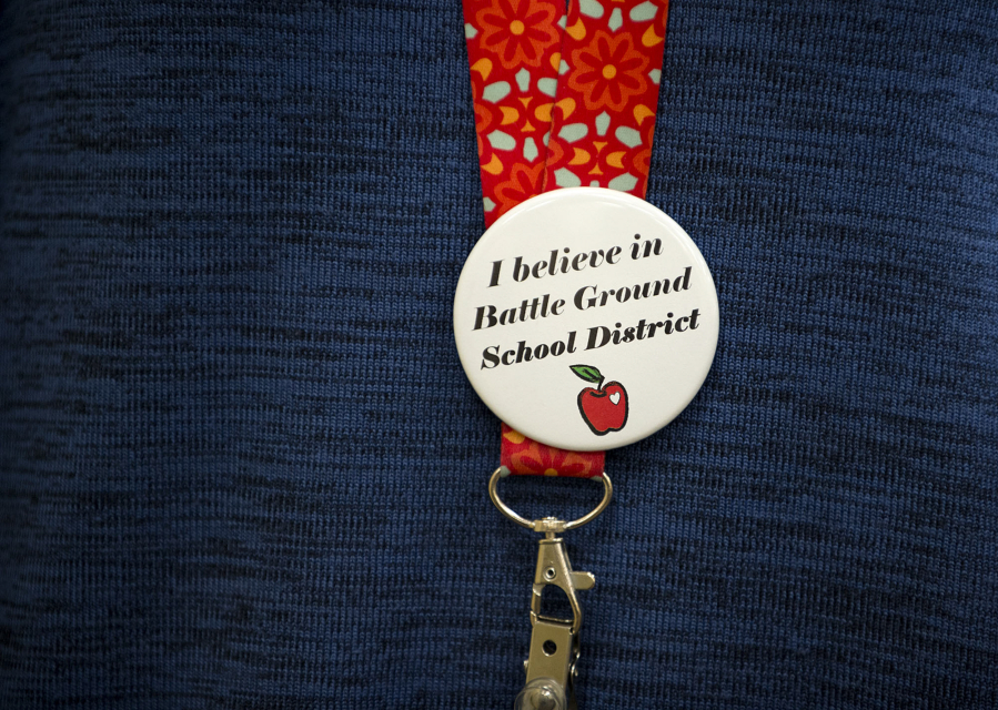 A teacher at Pleasant Valley Primary wears a button showing support for the Battle Ground Public Schools. The district will ask voters to approve an $80 million bond this November.